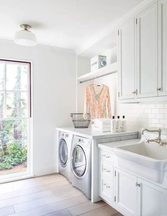 all white laundry room