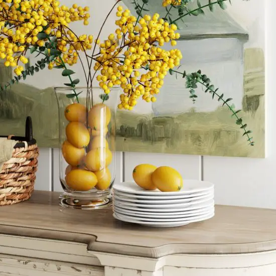 lemons in large glass jar for decoration