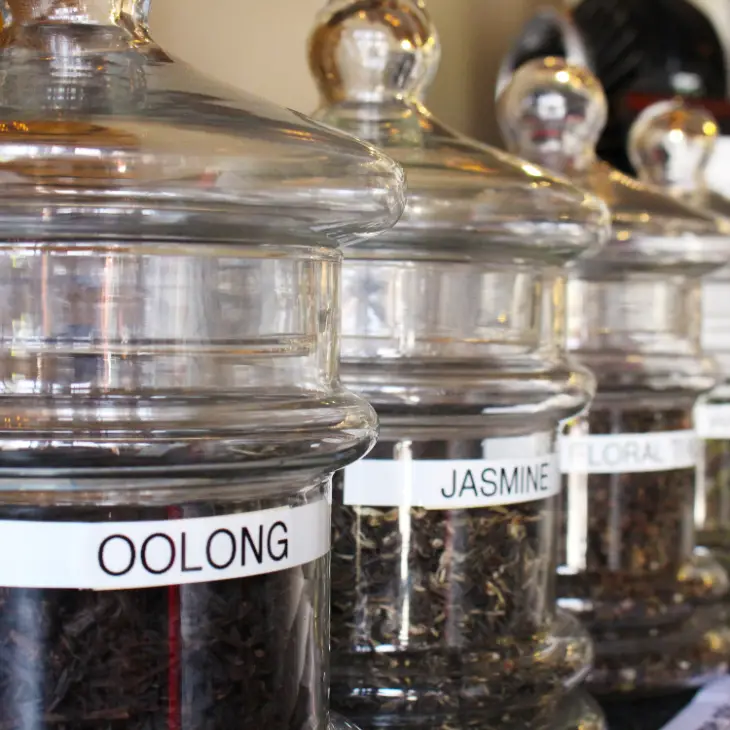 tea in jars on kitchen counter